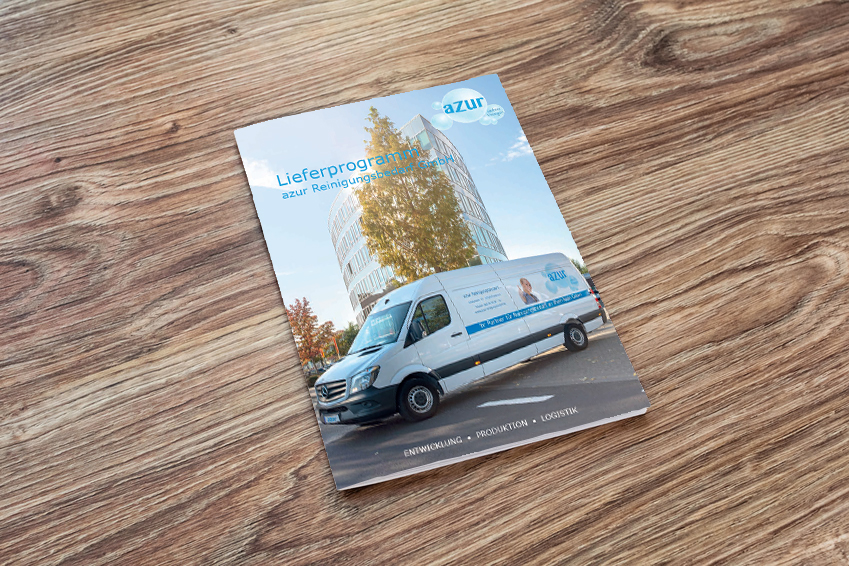 Blank of brochure is on a wooden desk. Template for your design.